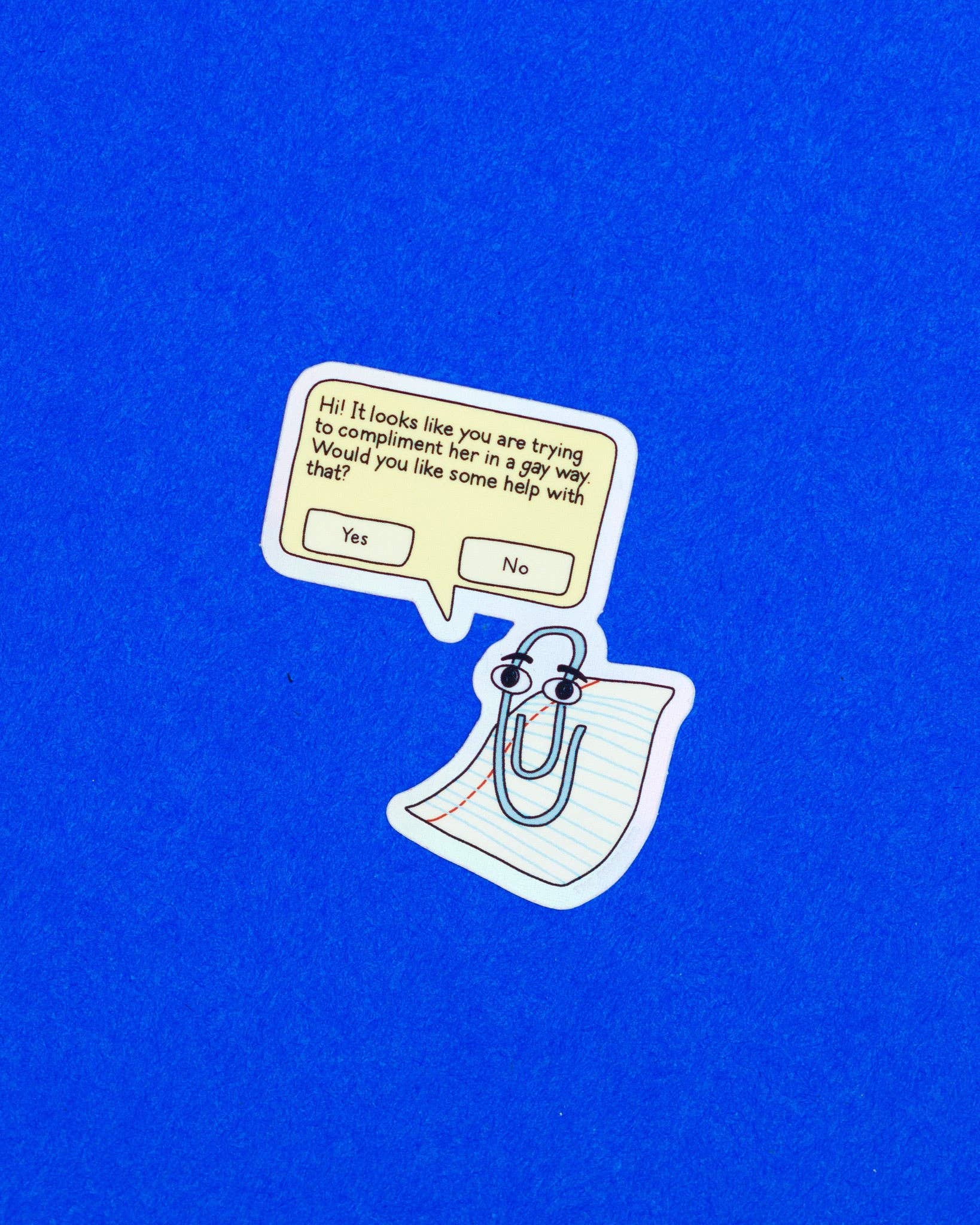 The Peach Fuzz Gay Clippy Holographic Sticker (In Store Only)